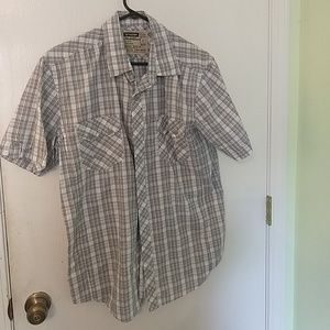 Grey plaid button up shirt.